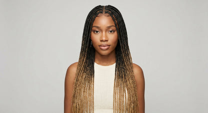 Woman wearing Halora knotless box braid wig — front portrait