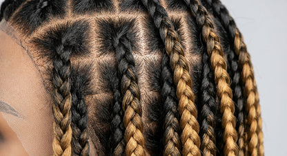 Knotless box braid pattern detail on scalp